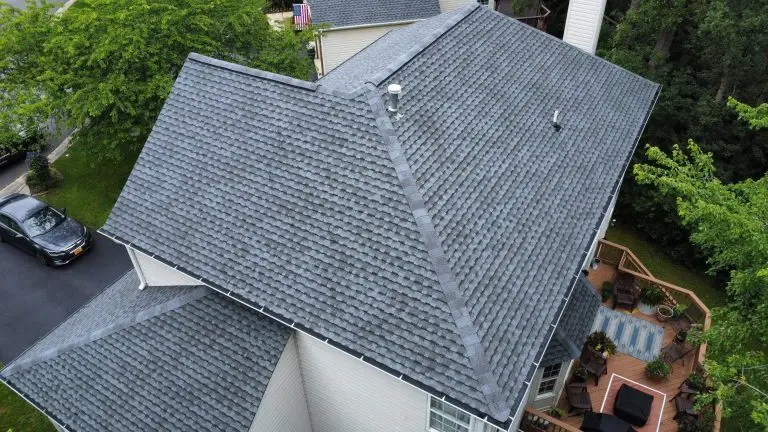 Aerial view of gray roof shingles and roof valleys