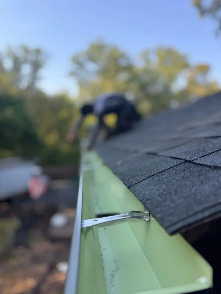 Close view of a shingled roof edge