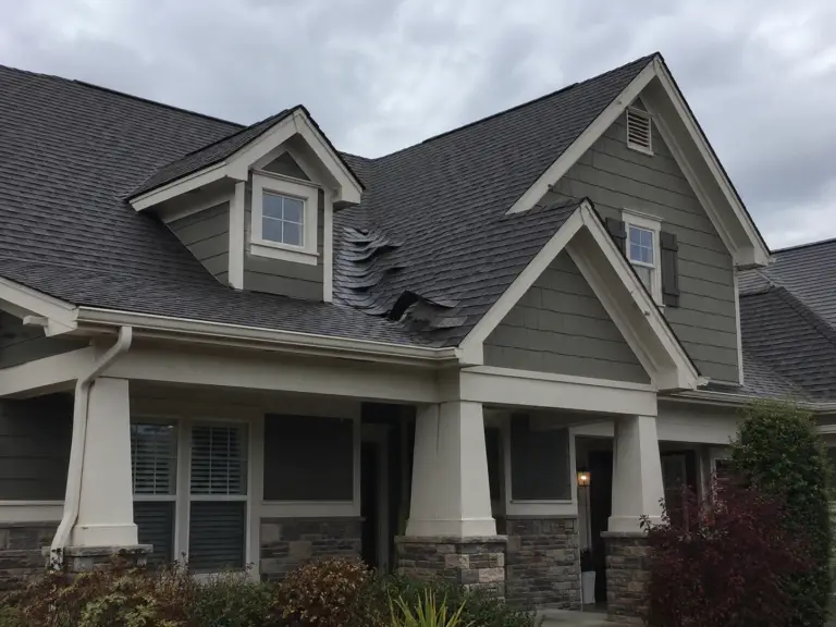 lifted shingles wind damage