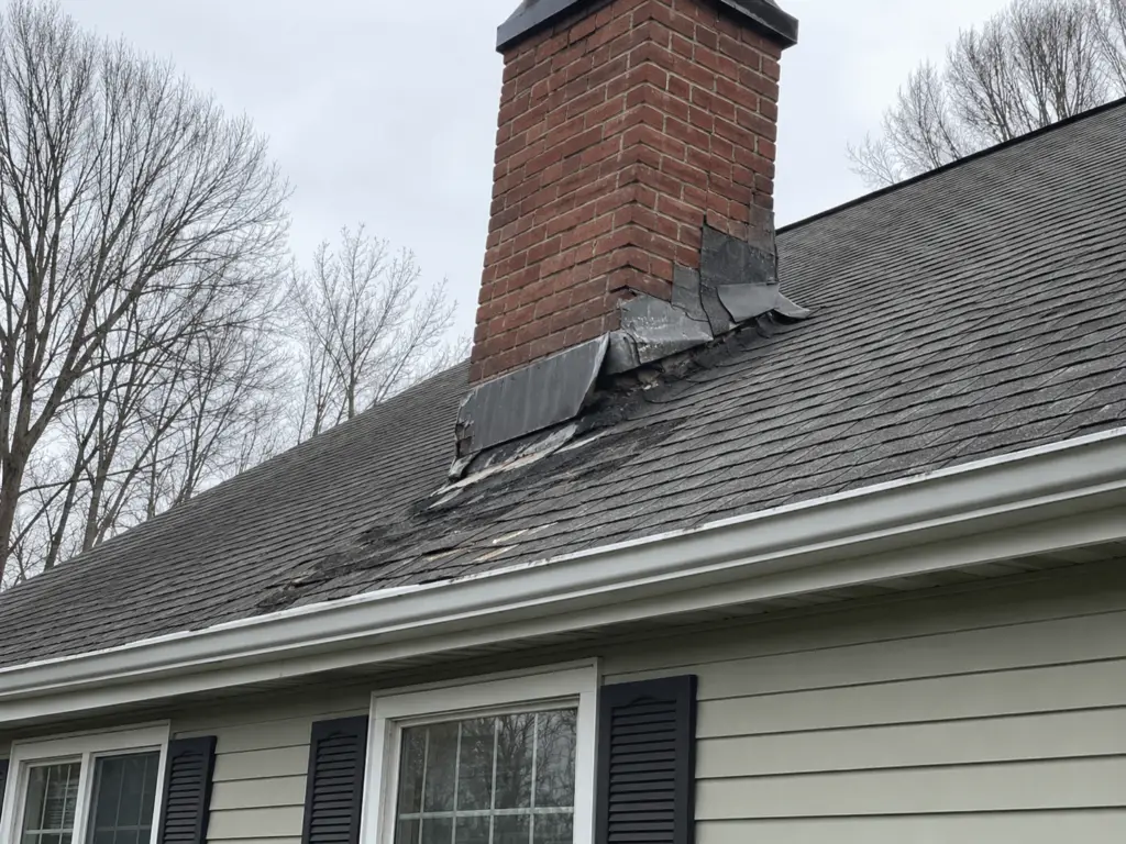 chimney flashing damage signs