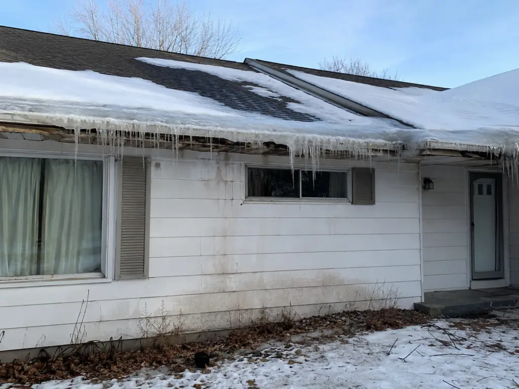 ice dam roof damage